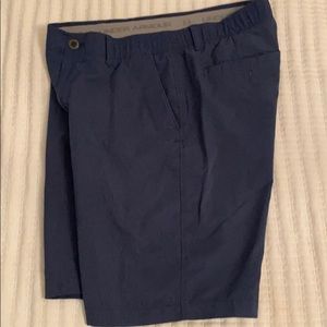 UA navy golf shorts
